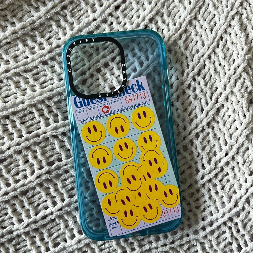 Casetify smiley face iPhone 13 Pro case